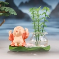 Cute monk crystal ornament with hydroponic glass vase and green lotus leaf base - 1222-4 Stretching Monk with Vase