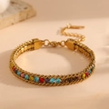 Macro view of gold-plated titanium bracelet with multi-color rhinestones and adjustable chain - Gold Colorful Zirconia (K209)