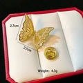 Gold butterfly brooch with sparkling crystals and size specs in a jewelry box - Hollow Butterfly (C263)