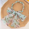 Serre-tête fleuri bleu clair en tissu avec une élégante chaîne de perles et strass - Vert