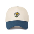 Detail of sunflower and smiley face embroidery on a two-tone baseball cap crown - Beige/Deep Blue