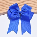 Detailed view of the 6 inch blue grosgrain ribbon bow hairpin with swallowtail design - Blue