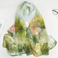 Long summer sun protection scarf with green, yellow, and pink gradient lotus floral print - Narcissus Green