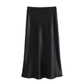 Detail showing the smooth satin texture and elegant drape of the black midi skirt - XS / Black
