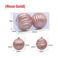 Two 10cm rose gold flocked Christmas balls with stripe and wave patterns in a box - 10cm (Pack of 2) / Rose Gold