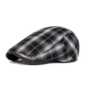 Classic newsboy cap with black and white plaid pattern and solid black brim - Adjustable / Black