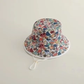 Close-up of kids sun hat with colorful mushroom and strawberry patterns and chin strap - 50-54cm (Adjustable 3-10 Years) / Color Graffiti