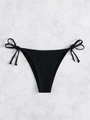 Classic black tie-side bikini bottoms with adjustable bows on a marble background - Black (Bikini Bottom Only)