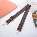 Detail of adjustable polyester wide shoulder strap with brown and blue chevron patterns - Light Gold Buckle / Brown/Navy Geometric Stripe