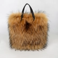 Brown faux fox fur handbag with black leather handles featuring a gradient texture - Brown