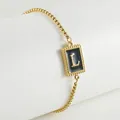 18K gold plated stainless steel bracelet featuring black oil drip pendant with letter L - Letter L (ZH497G-L-02)
