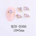 Macro detail of purple aurora heart nail charms with 10x5mm gold alloy base and side rhinestones - Starry Pink Golden Style (9366)