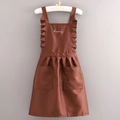 Brown canvas apron featuring ruffled shoulder straps and lovely embroidery with dual pockets - Lettered Princess Style - Coffee