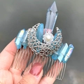 Handmade hair comb featuring blue aura crystal pillars and a hollow metal moon charm - Hair Comb / Blue