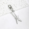 Detailed close-up of a white and silver star-shaped electric guitar keychain accessory - White