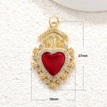 Macro shot of gold-plated red heart pendant with dimensions 27mm height and 18mm width - R006-Crown Flame Heart