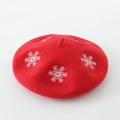 Detailed close-up of red wool felt beret featuring white snowflake embroidery pattern - M (56-58cm) / Red Snowflake