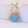 Golden rhinestone handbag keychain with blue and white crystals on white gift box - Blue