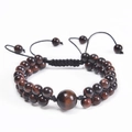 Macro detail of double-layer woven Tiger Eye stone bracelet with adjustable black cord - Red Tiger Eye Bracelet