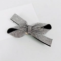 Detailed view of luxury black rhinestone bow hair clip with sparkling crystal accents - 8cm Medium Figure-8 Spring Clip White Rhinestone
