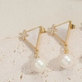 Golden triangle earring with white shell, star detail and a dangling white pearl - ES2553 Triangle Pearl Pendant
