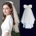 Detailed comparison of white bridal veil with bow ornament and layered tulle texture - Double Layer Bow New Style 50CM