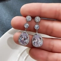 Macro shot of silver teardrop bridal earrings with AAA cubic zirconia in sparkling detail - A Pair Of Led-115 Earrings