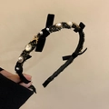 Elegant black woven headband with white pearls, gold-rimmed gems and bows detail - Style F (Woven Gold Thread + Pearl Bow)