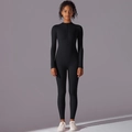 Front view of black long-sleeve yoga bodysuit featuring a zip-up collar and tight fit - S / Black