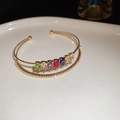 Bracciale rigido dorato a due strati con gemme colorate e pavé di micro zirconi scintillanti - Oro-Pietra Preziosa Colorata Doppio Strato (16#HB3099)