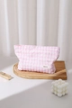 Close-up of pink checkered toiletry bag with bow embroidery on textured seersucker fabric - 26x18cm / Pink Check (Large)