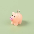 Pink resin pig pendant for kids DIY jewelry with a glossy finish and metal ring - Pig