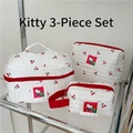 Lot de trois trousses de maquillage en coton matelassé blanc à motifs cerises - Cerise