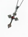 Detailed view of silver cross necklace with ornate textures and a center red gemstone - Silver Relief Cross - Red Gemstone(AQ-1630)