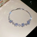 Detailed view of silver oval zircon bracelet showing high-shine geometric crystal settings - Transparent Oval Zircon Style / White