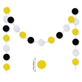 Detailed view of graduation paper garland featuring black, yellow, and white 5cm circles - Polka Dot Garland / Black Gold White