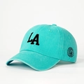 Detail of mint green baseball cap with LA embroidery and Los Angeles side patch - One Size / Lake Blue With Black Logo
