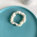 Creamy white fabric scrunchie with yellow daisy print on a blue ceramic plate - 8# White Floral