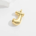 Detailed view of a golden balloon-style letter J pendant on a minimalist white stone background - Gold-J