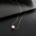 Elegant gold chain necklace with a natural pink-purple baroque pearl pendant on black - 04-K12 Natural Purple Large Pearl Necklace