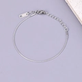 Cavigliera argento a catena serpente con targhetta K18 e chiusura a moschettone regolabile - Bracciale / Argento