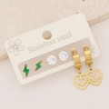 Detailed view of three pairs of stainless steel earrings including lightning and heart motifs - Green Lightning White Zirconia Gold Heart Anchor Set (9#)