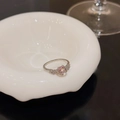 Detail of silver butterfly ring featuring a pink heart-shaped crystal on ceramic plate - Silver - Single Pink Heart Star Ring