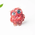 Red crystal owl resin figurine with large blue eyes and internal stone textures - Red and White Dots