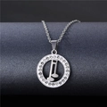 Polished stainless steel musical note pendant necklace with sparkling crystal halo - NZ10 Double Musical Note