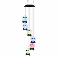 Solar powered Halloween wind chime featuring glowing LED Jack Skellington skull lights - Ghost