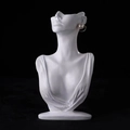 Profile view of white mannequin bust displaying a single pearl earring on black background - 32cm Bust / White