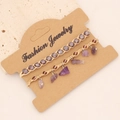 Detail of purple natural stone beaded bracelets on a kraft jewelry display card - Purple Crystal