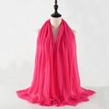 Long rose red pleated cotton linen scarf with frayed edges on a mannequin - Rose Red