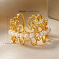 Macro detail of golden open ring showing 1.7cm diameter and 1.2cm width measurements - Hollow Flower Pearl Ring